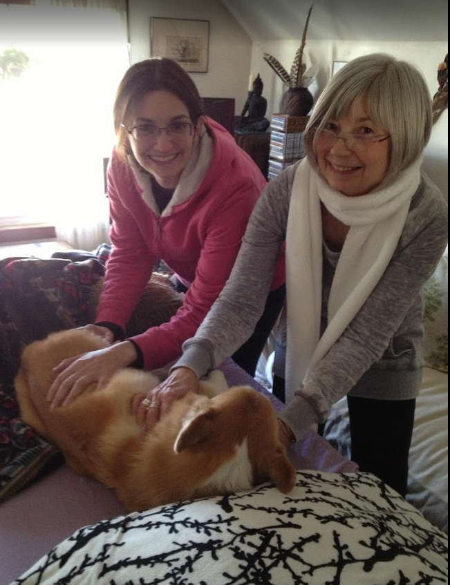Jess practicing Reiki with her mentor